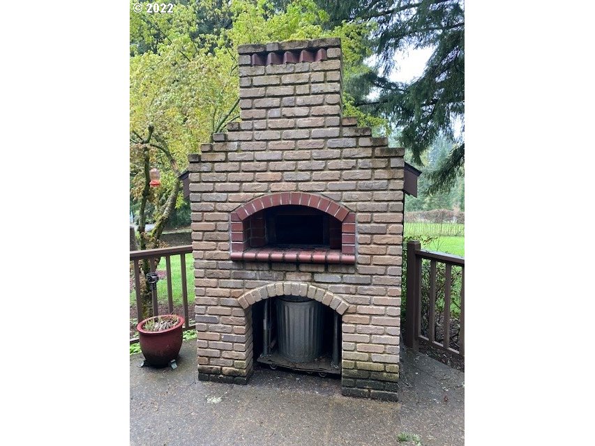 41945 Southeast Dover Court Sandy, OR 97055 - Photo 22 of 32 a front view of a house with a fireplace