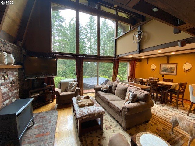 41945 Southeast Dover Court Sandy, OR 97055 - Photo 3 of 32 a living room with furniture and a floor to ceiling window