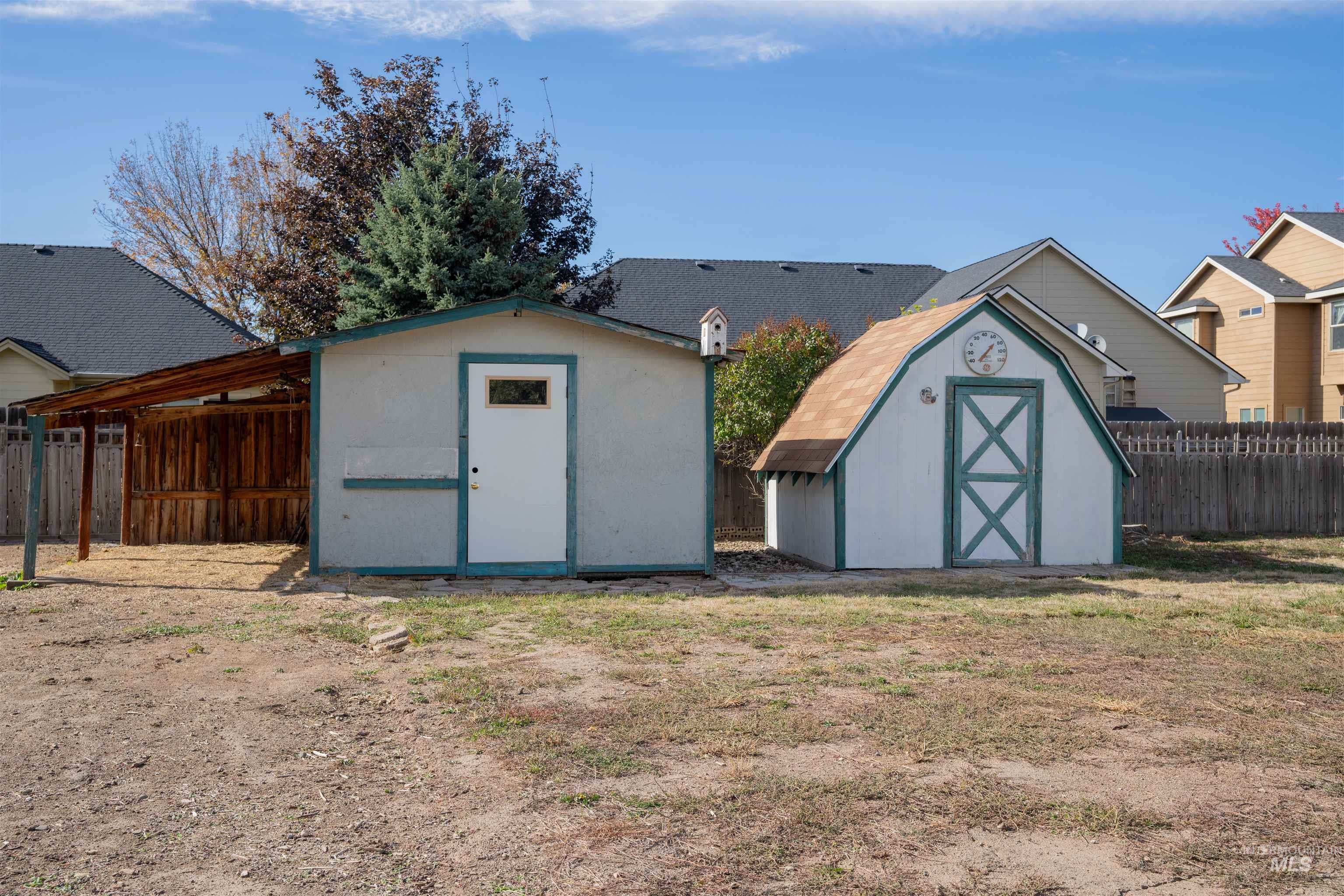 4667 Shawnee Way Boise, ID 83709 - Photo 6 of 24 View of shed with a fenced backyard