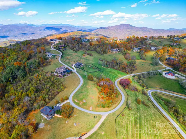 a view of a swimming pool with a mountain