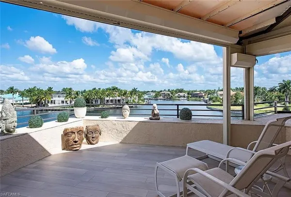 a view of swimming pool with seating