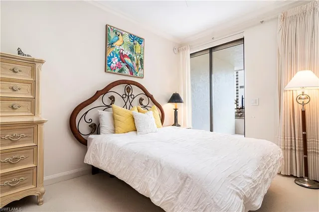 a bedroom with a bed and a closet