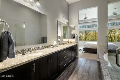 a bathroom with a bathtub and shower