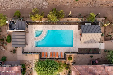 aerial view of a house with a swimming pool