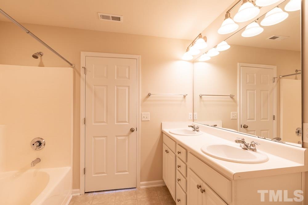 7039 Racine Way Raleigh, NC 27615 - Photo 22 of 30 Master Bathroom