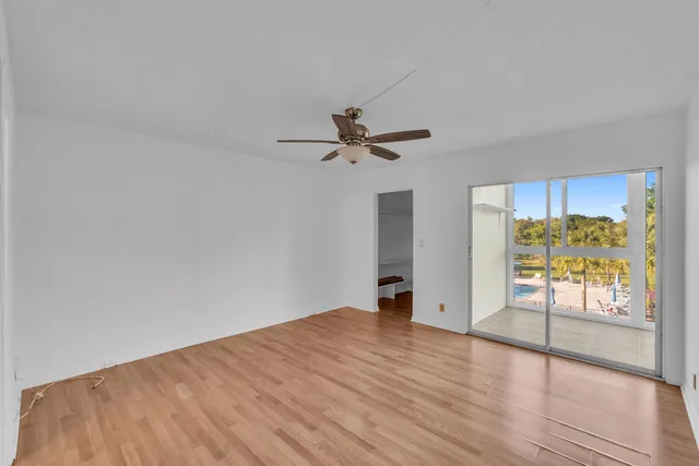 a view of an empty room and window