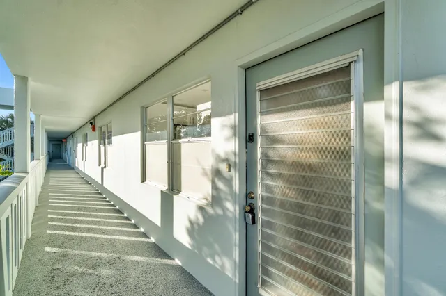a view of a glass door and shower