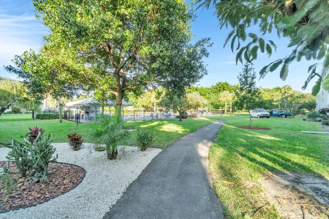 a view of a garden with a fountain