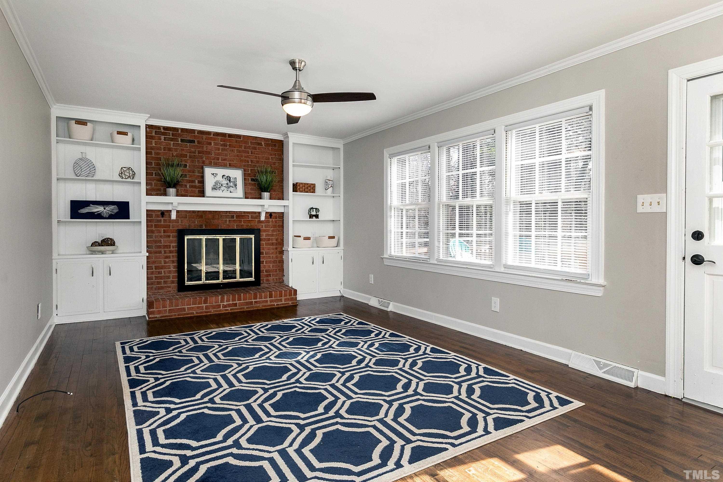 2012 Port Royal Road Raleigh, NC 27609 - Photo 9 of 36 a view of a livingroom with wooden floor
