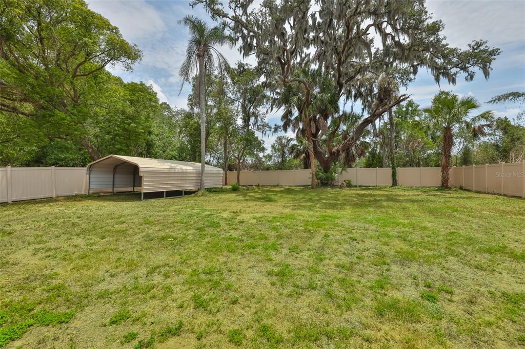 708 Coade Stone Drive Seffner, FL 33584 - Photo 3 of 48 a garden view