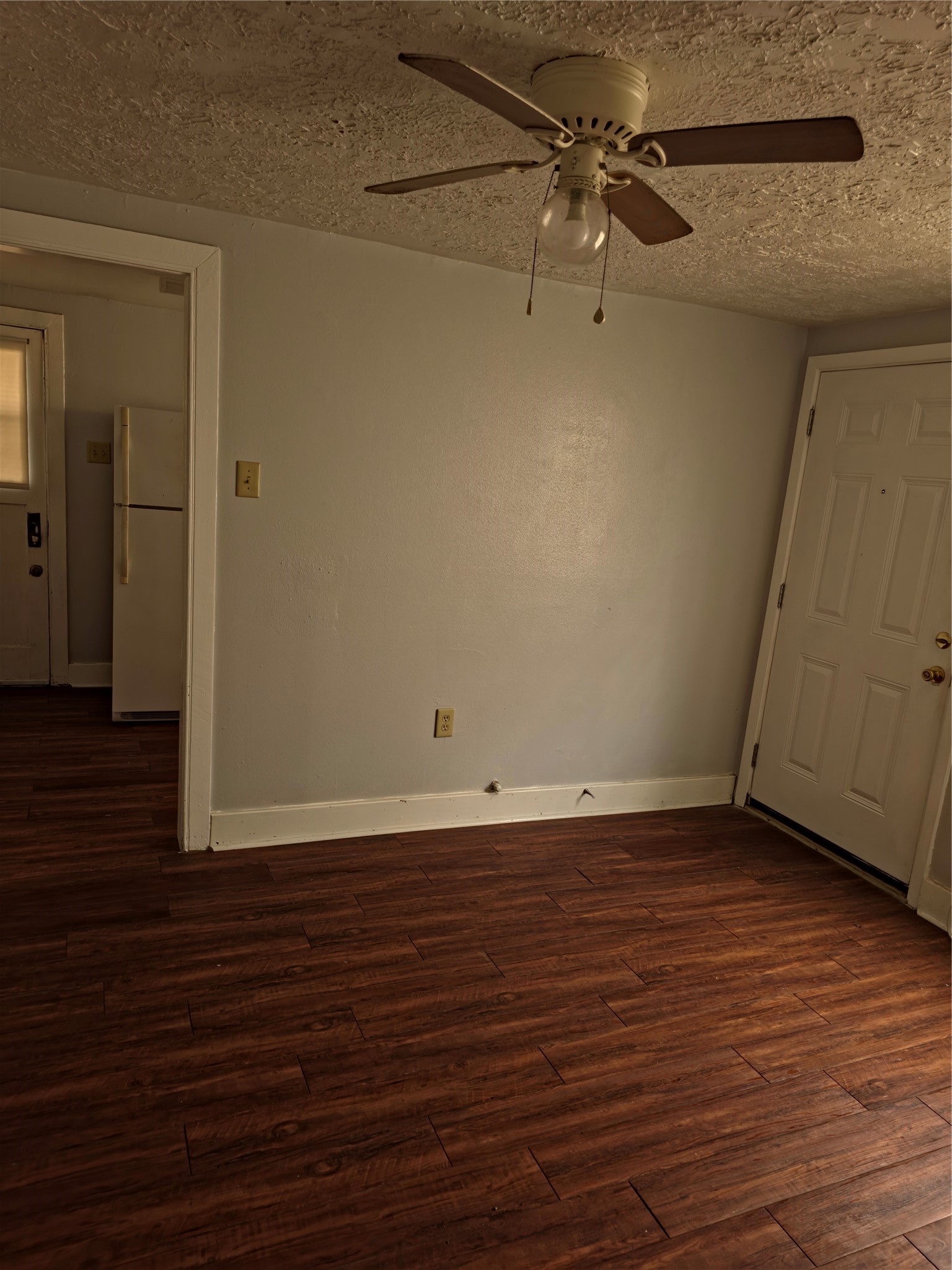 207 Moody Street, Unit 4 Houston, TX 77009 - Photo 11 of 11 a view of a room with wooden floor and white walls
