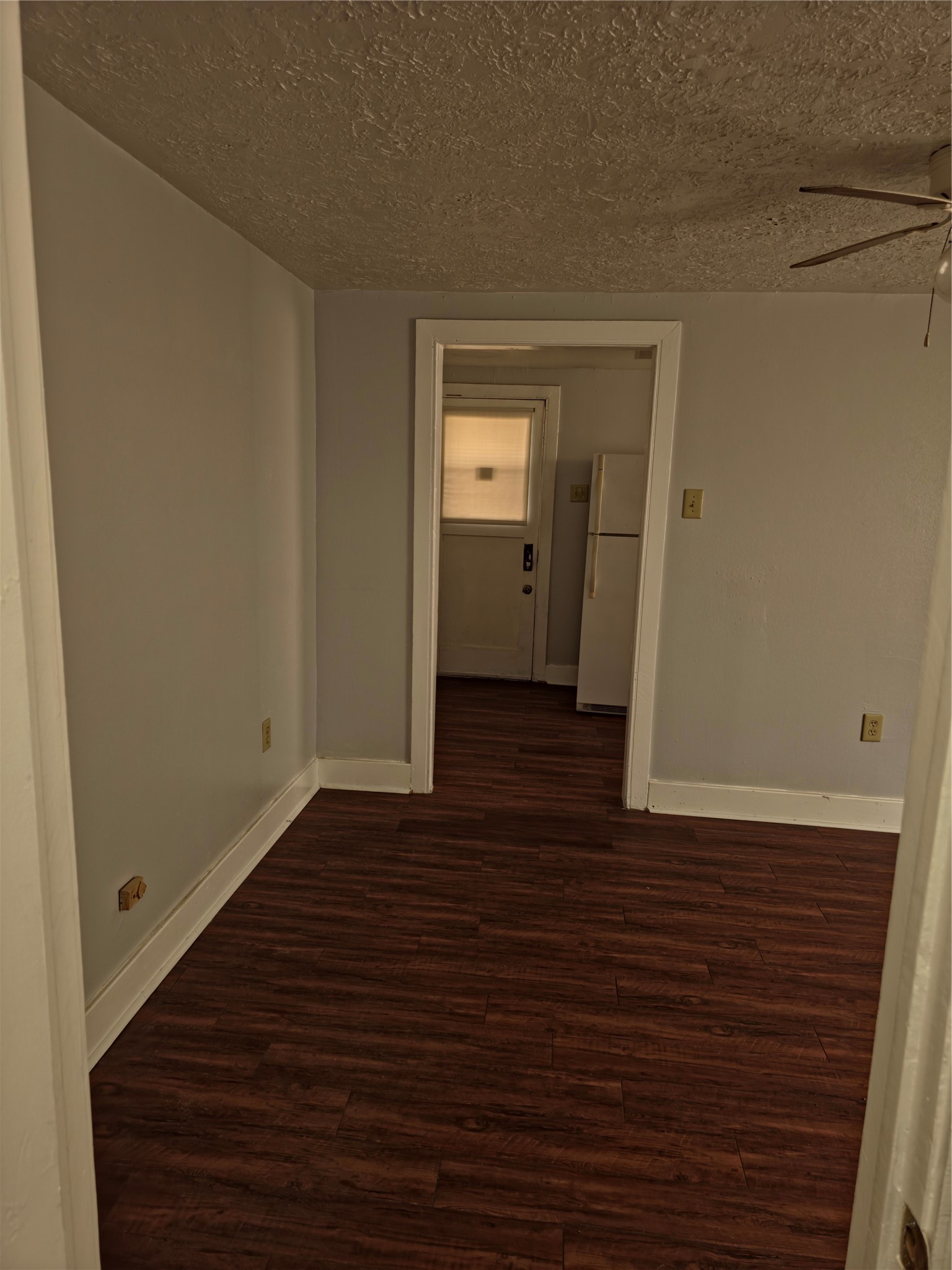 207 Moody Street, Unit 4 Houston, TX 77009 - Photo 4 of 11 a view of an empty room with wooden floor and a window