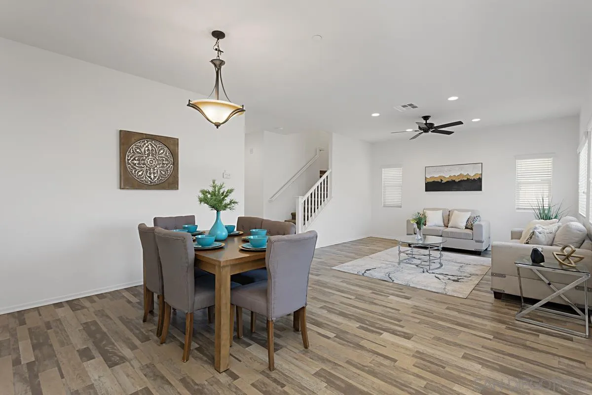 258 Windsor Grey Way Fallbrook, CA 92028 - Photo 17 of 44 a view of a dining room with furniture