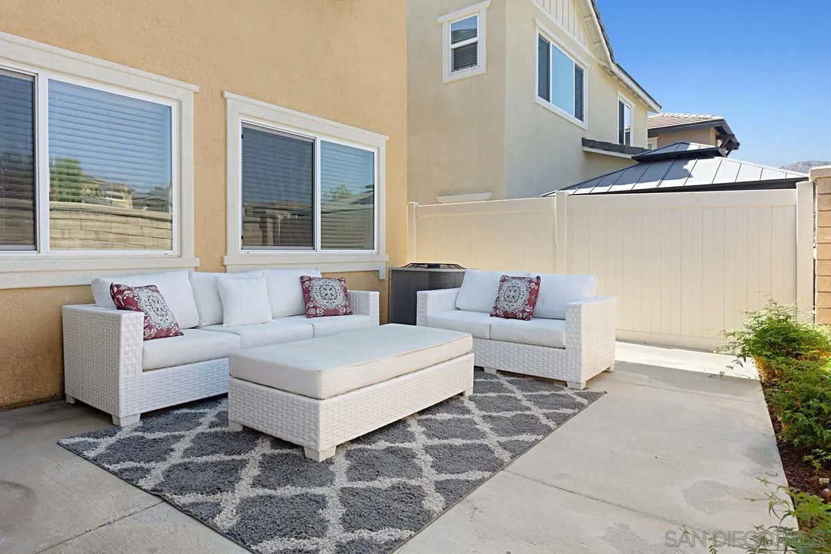 258 Windsor Grey Way Fallbrook, CA 92028 - Photo 22 of 44 a living room with furniture and a potted plant