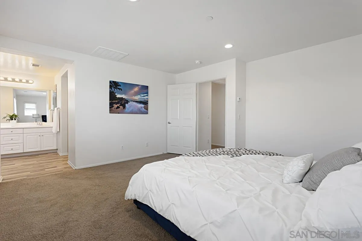 258 Windsor Grey Way Fallbrook, CA 92028 - Photo 25 of 44 a bedroom with a large bed