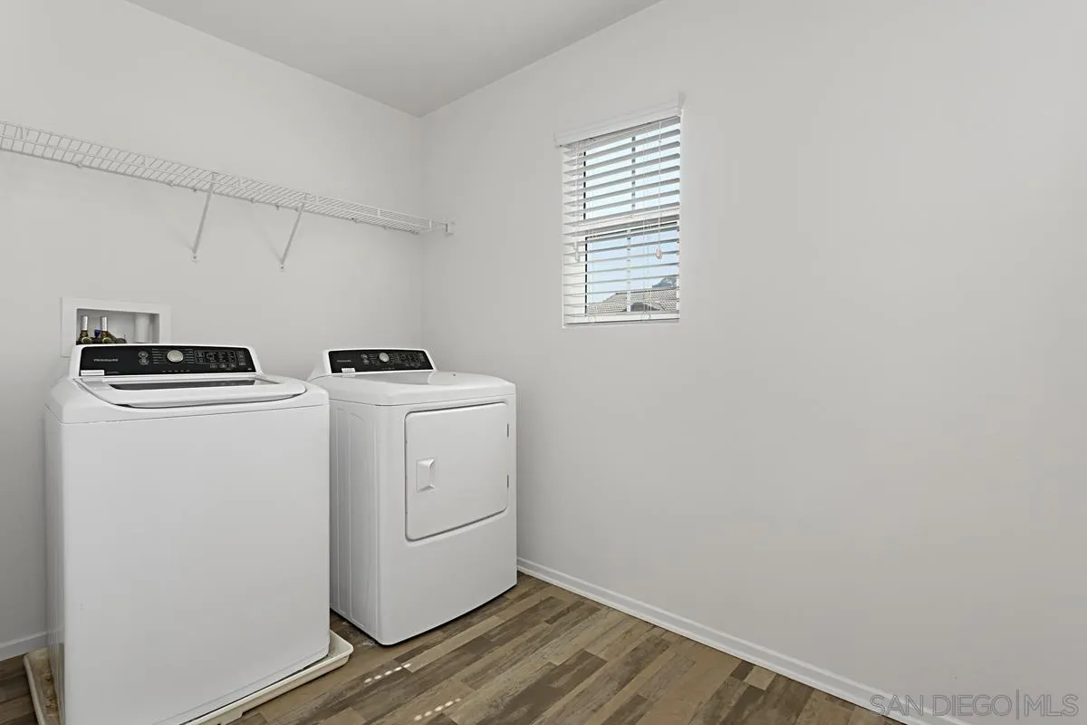 258 Windsor Grey Way Fallbrook, CA 92028 - Photo 31 of 44 a utility room with dryer and washer