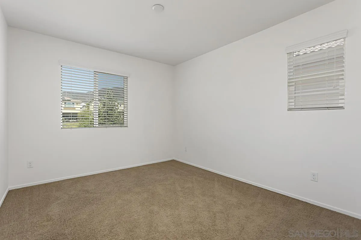 258 Windsor Grey Way Fallbrook, CA 92028 - Photo 34 of 44 an empty room with a window