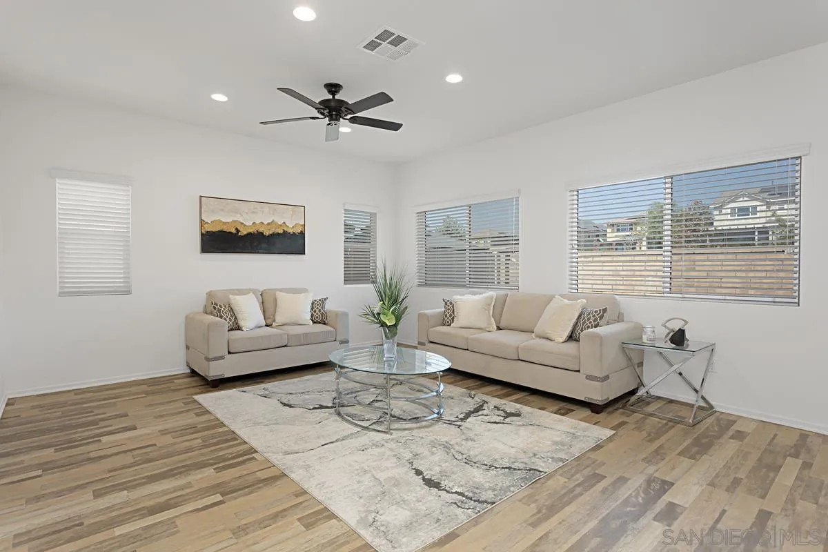 258 Windsor Grey Way Fallbrook, CA 92028 - Photo 9 of 44 a living room with furniture and a large window
