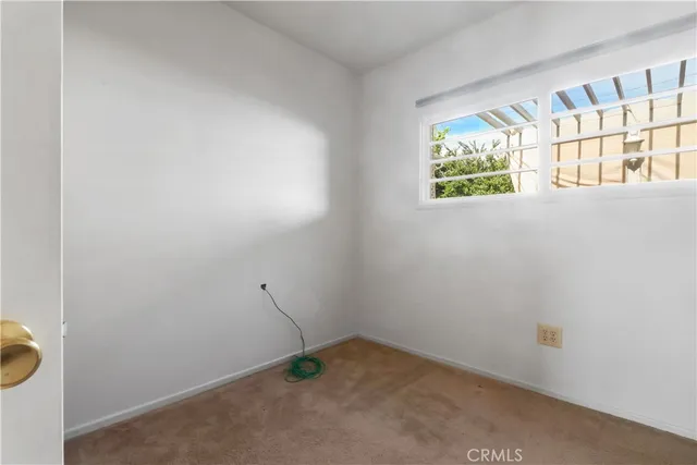 a bathroom with a toilet a sink and shower
