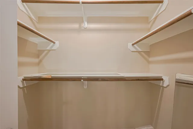 a view of a room with racks on the wall