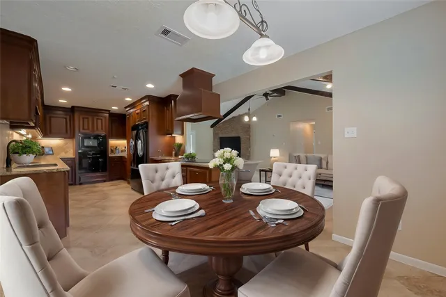 a view of a dining room with furniture
