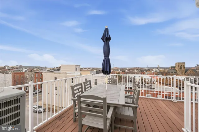 a view of a balcony with city view