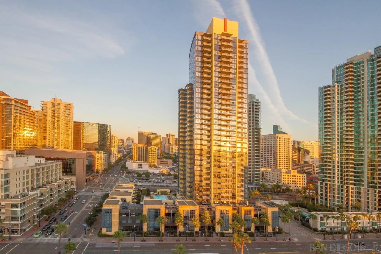 a view of a city with tall buildings