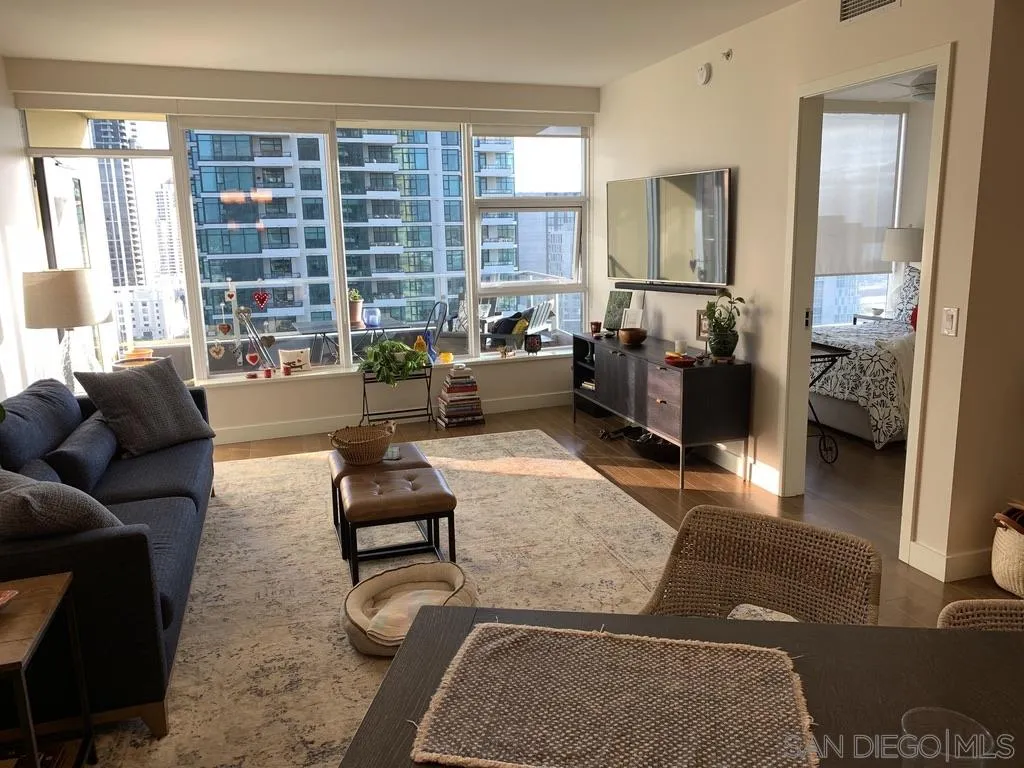 1325 Pacific Highway, Unit 1703 San Diego, CA 92101 - Photo 11 of 18 a living room with furniture and a large window