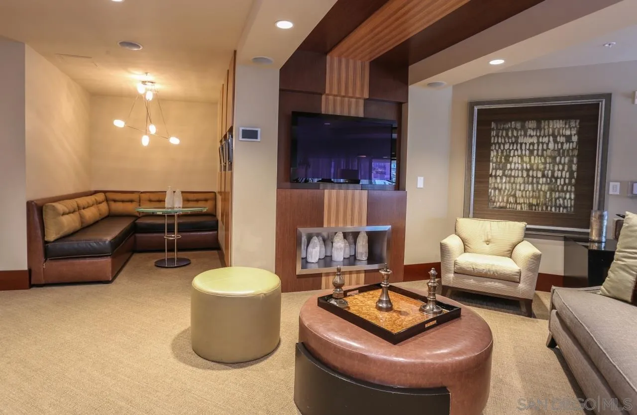 1325 Pacific Highway, Unit 1703 San Diego, CA 92101 - Photo 5 of 18 a living room with furniture and a potted plant