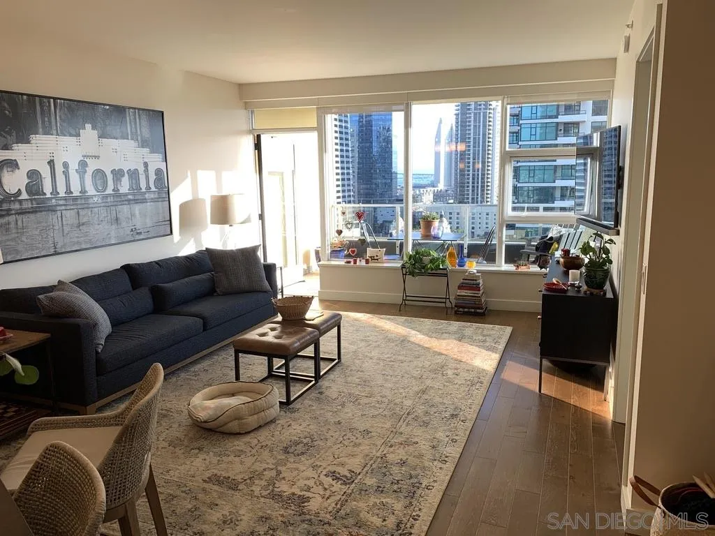 1325 Pacific Highway, Unit 1703 San Diego, CA 92101 - Photo 10 of 18 a living room with furniture and a large window