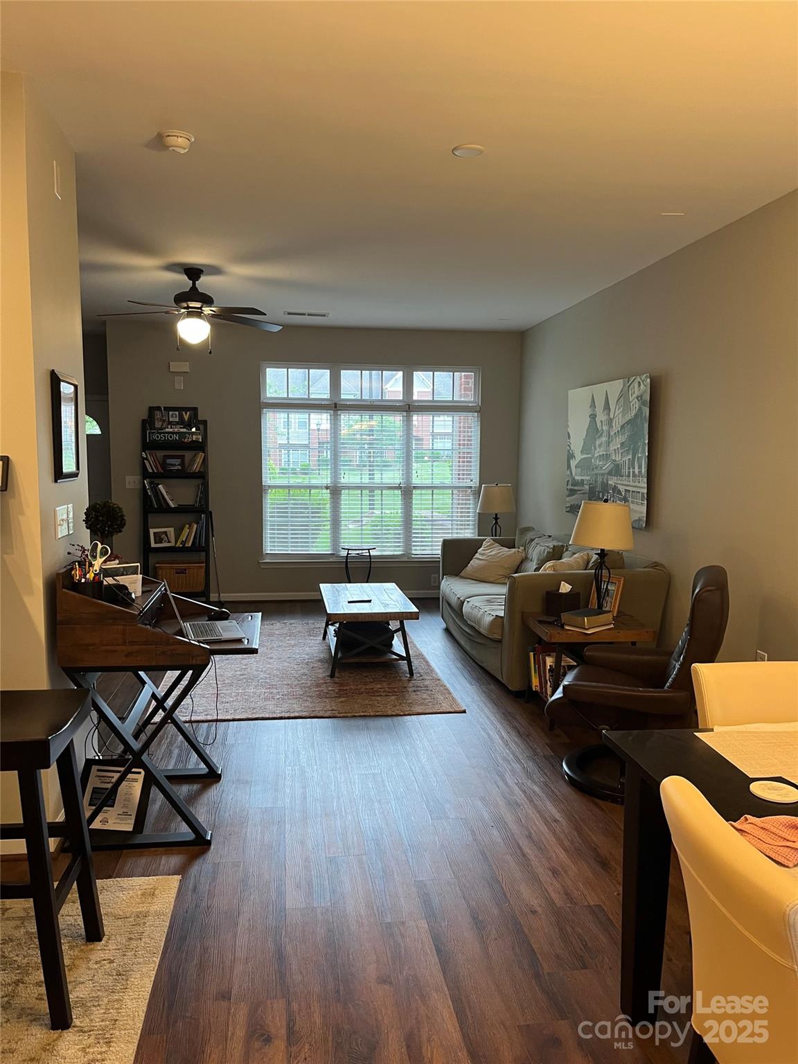 1131 Central Park Circle Davidson, NC 28036 - Photo 8 of 21 a living room with furniture and a large window