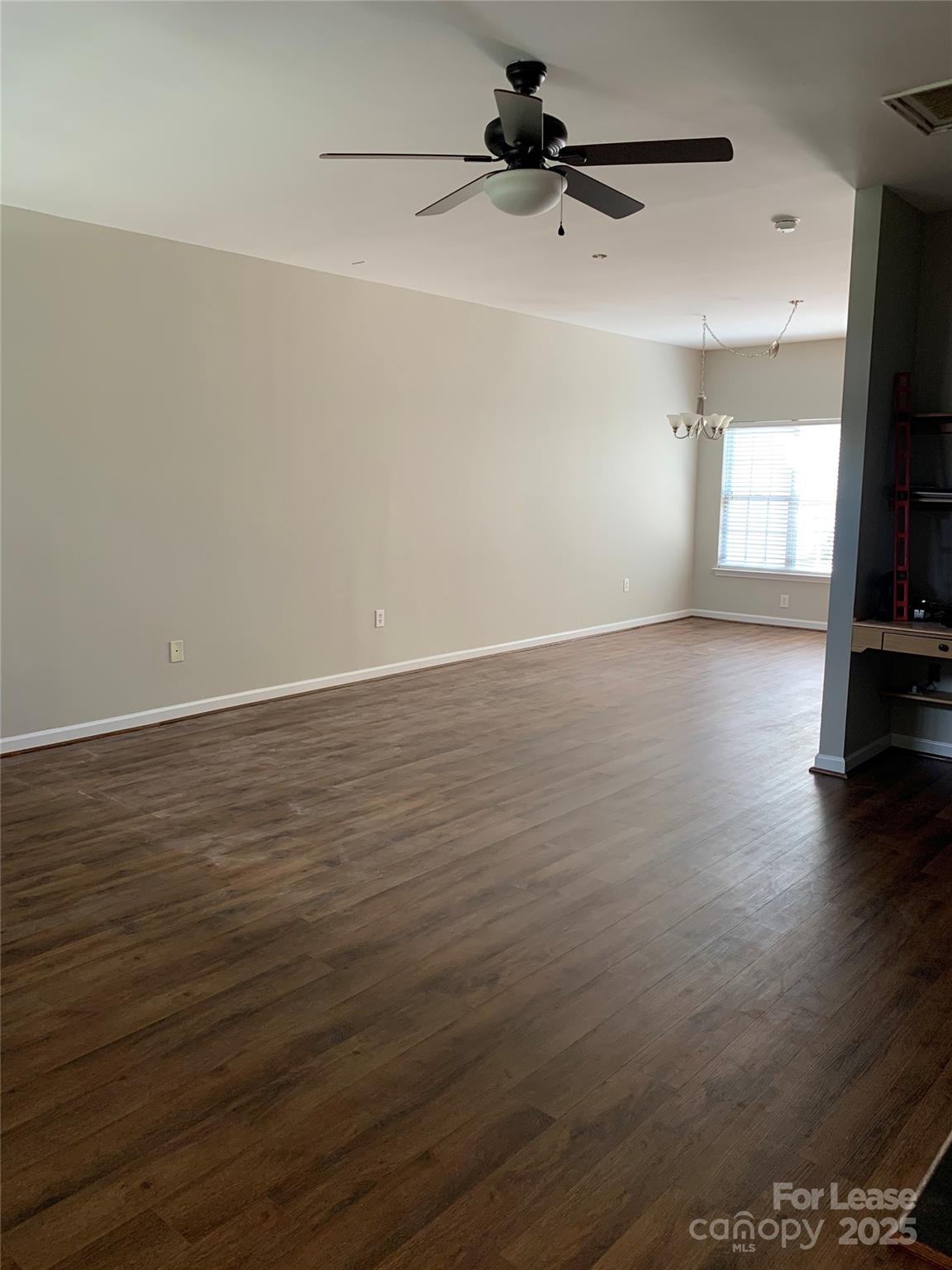 1131 Central Park Circle Davidson, NC 28036 - Photo 10 of 21 wooden floor in an empty room