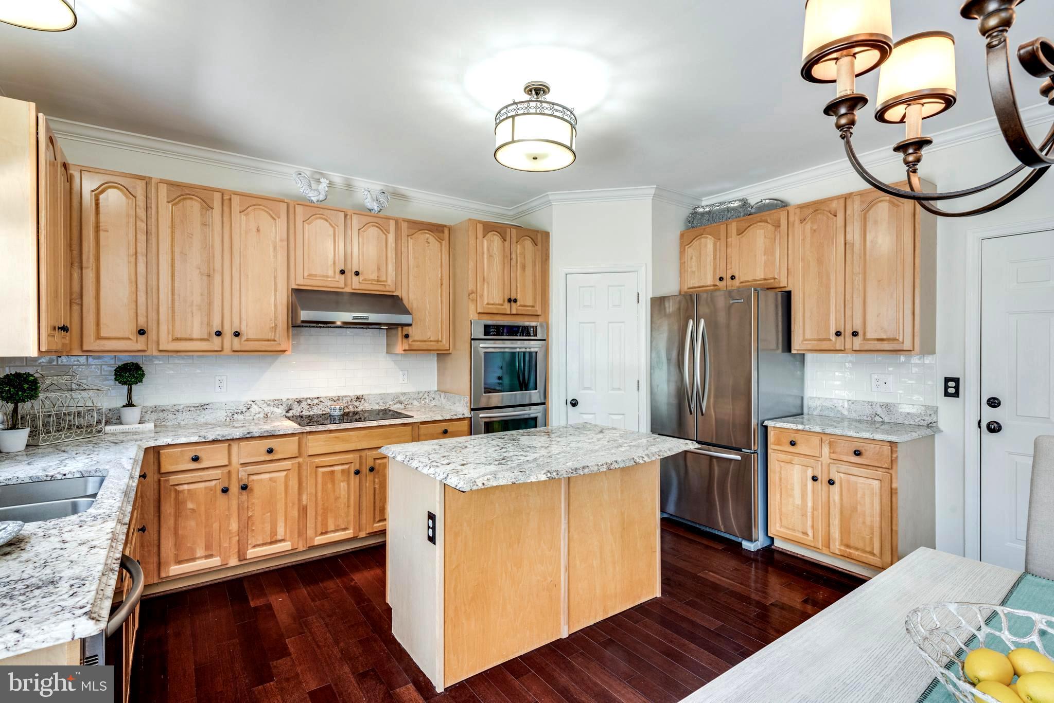 1566 Comanche Road Arnold, MD 21012 - Photo 19 of 51 Kitchen with Granite Counters & Island Dining Bar