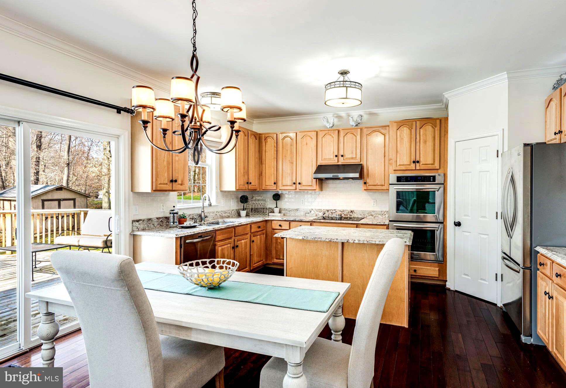 1566 Comanche Road Arnold, MD 21012 - Photo 22 of 51 Expanded Mealtime Options with Slider to Deck