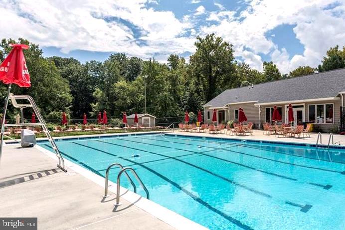 1566 Comanche Road Arnold, MD 21012 - Photo 43 of 51 Sparkling Community Pool & Sunbathing Patio