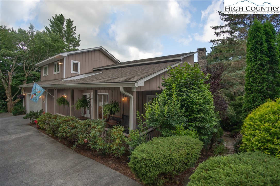 320 Misty Ridge Lane Blowing Rock, NC 28605 - Photo 3 of 46 an outdoor view of house and yard