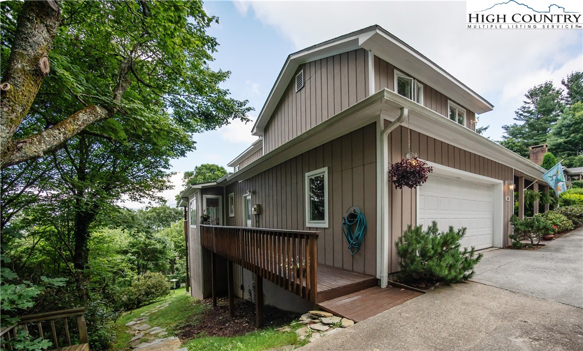 320 Misty Ridge Lane Blowing Rock, NC 28605 - Photo 44 of 46 a front view of a house with garden