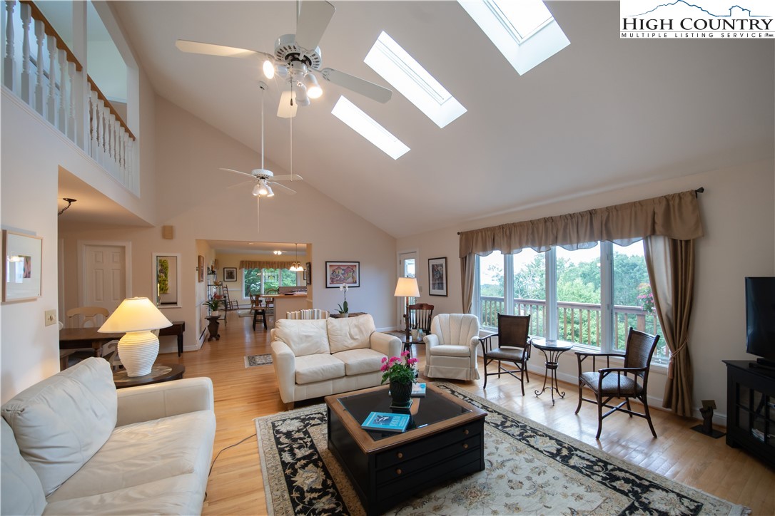 320 Misty Ridge Lane Blowing Rock, NC 28605 - Photo 9 of 46 a living room with furniture and a large window