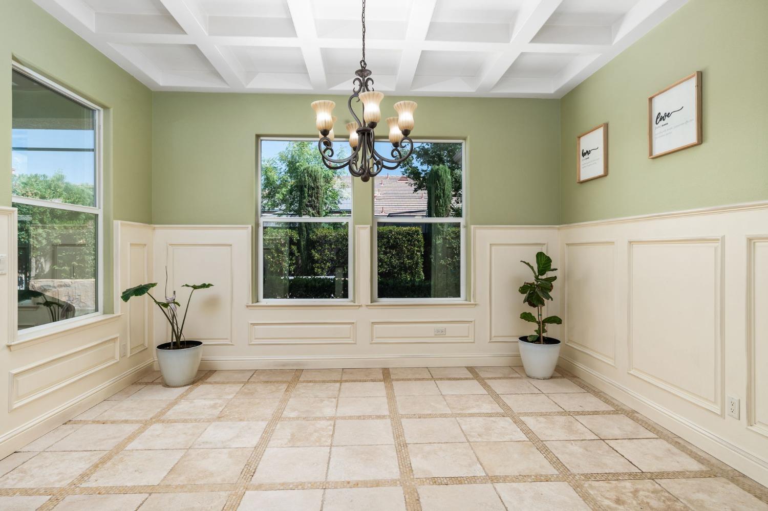 3545 Barclay Square Clovis, CA 93619 - Photo 13 of 31 a bathroom with a bathtub and window