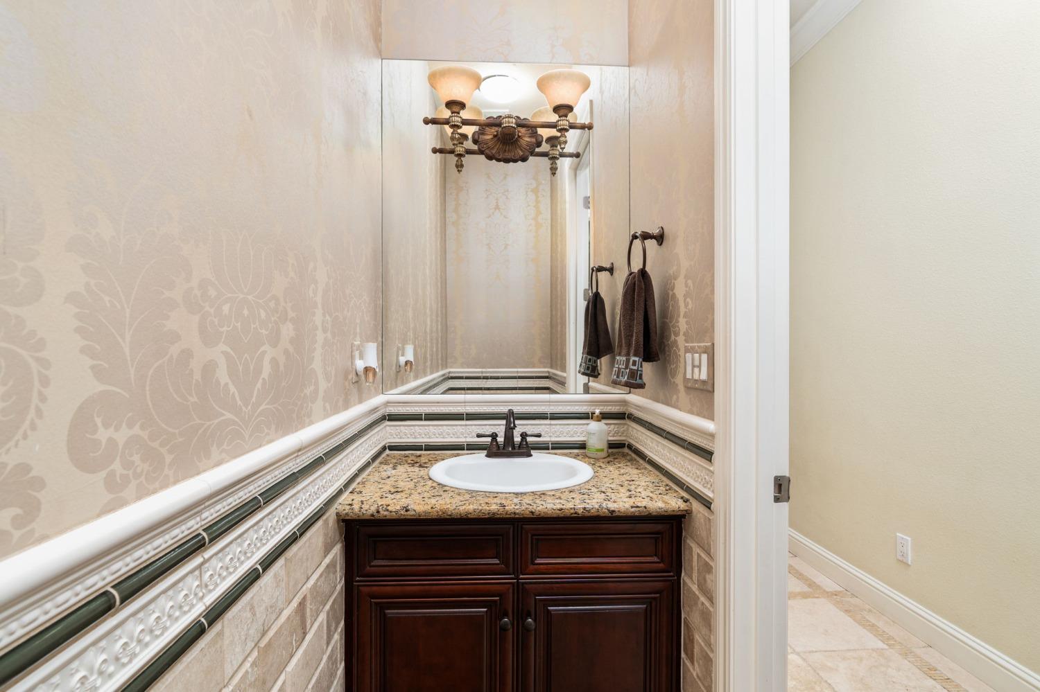 3545 Barclay Square Clovis, CA 93619 - Photo 24 of 31 a sink vanity and a mirror