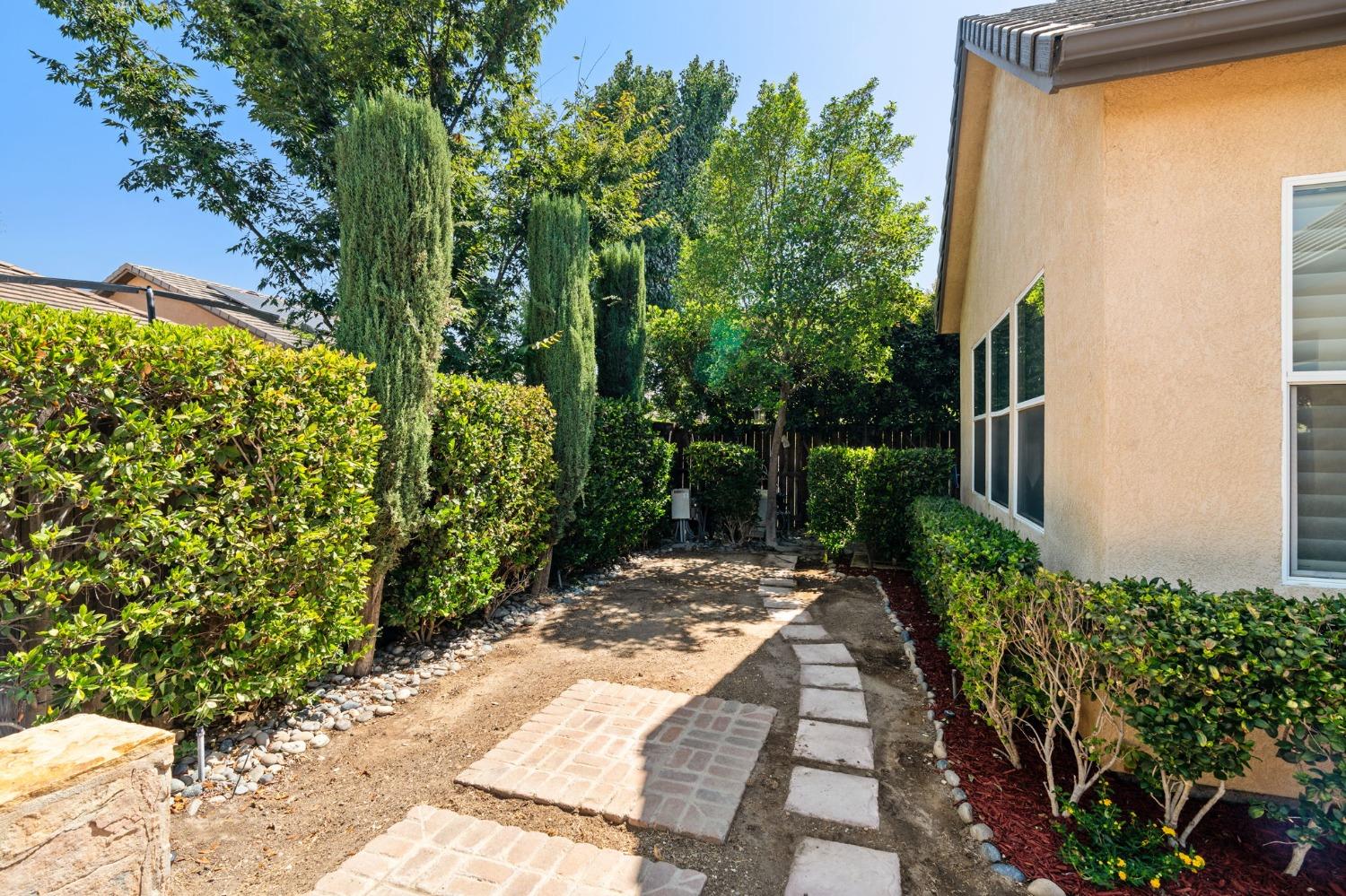 3545 Barclay Square Clovis, CA 93619 - Photo 30 of 31 a view of backyard with potted plants