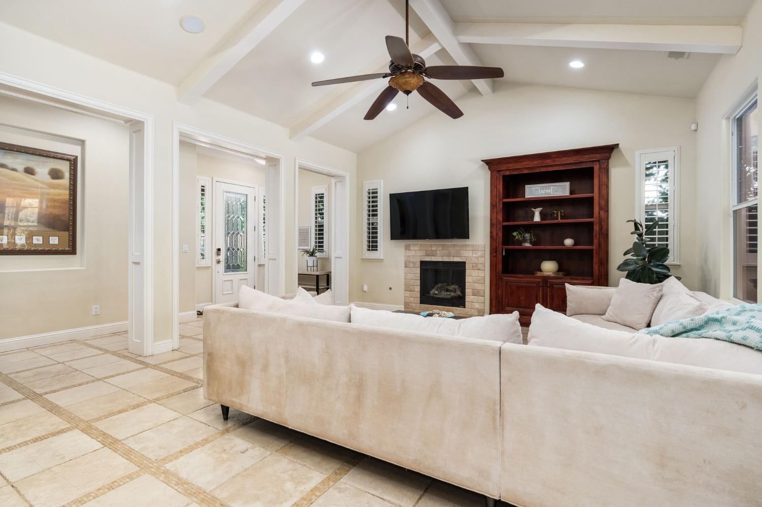 3545 Barclay Square Clovis, CA 93619 - Photo 8 of 31 a living room with furniture and a flat screen tv