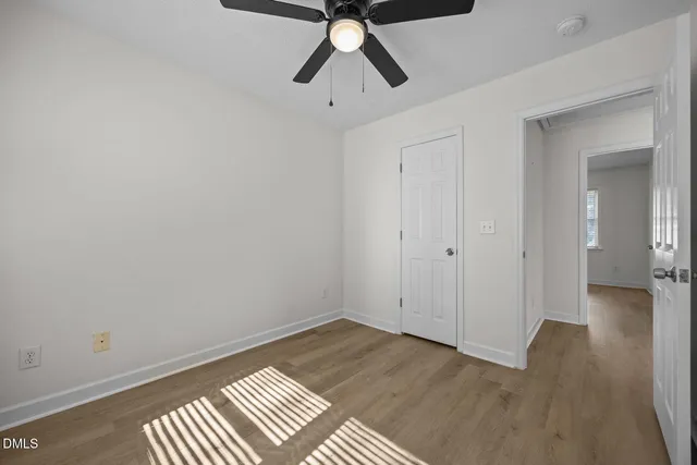 a view of entryway with wooden floor