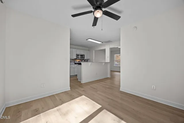 a view of a livingroom with a hardwood floor