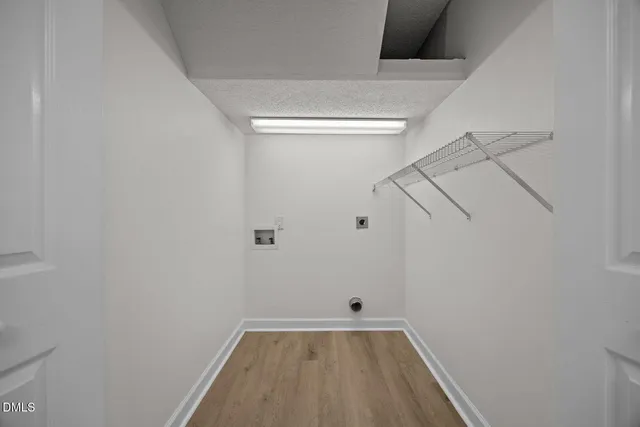 a view of small space with racks on the wall