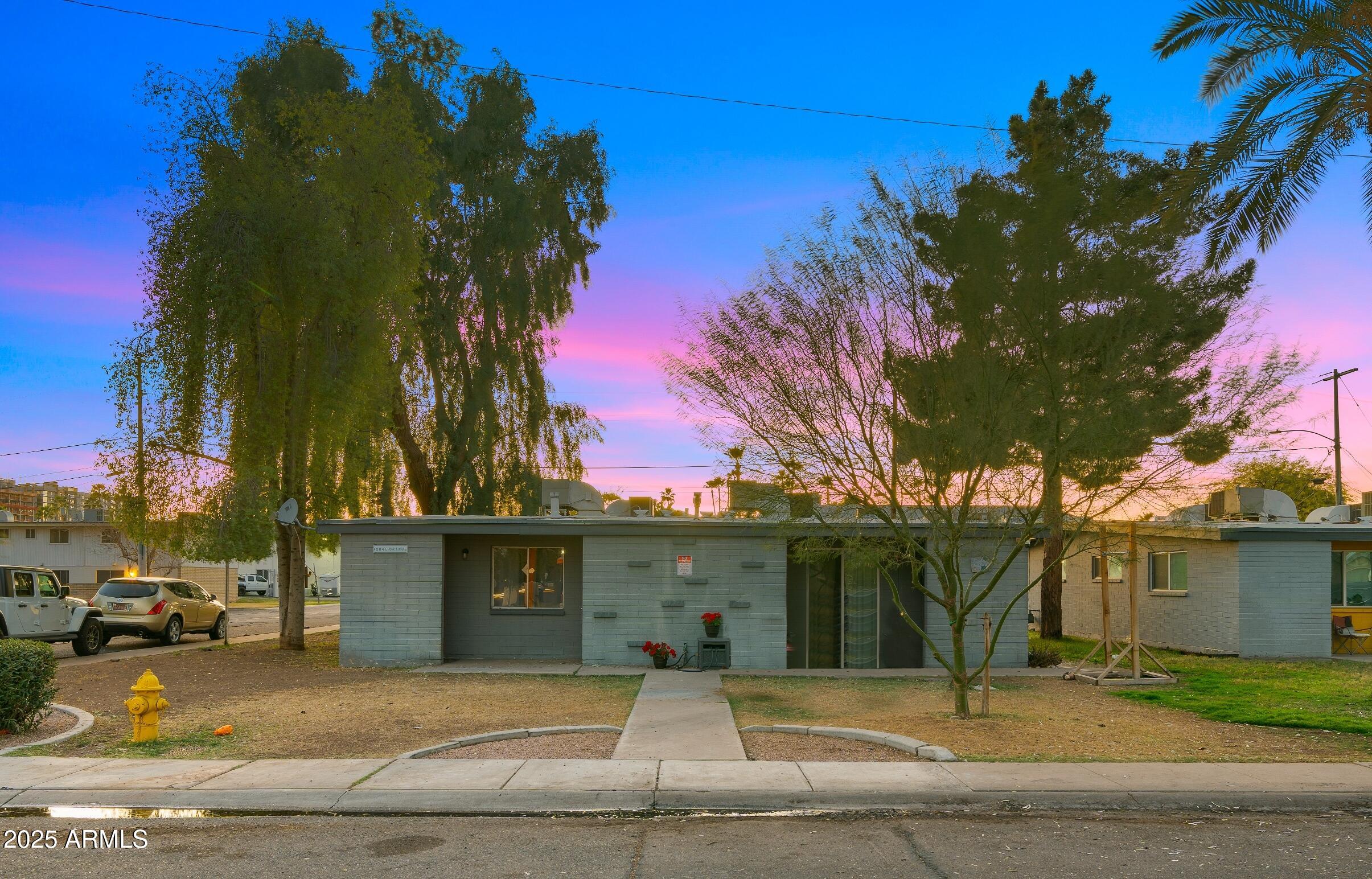 908 South Mariana Street, Unit A Tempe, AZ 85281 - Photo 2 of 10 a front view of a house with a yard