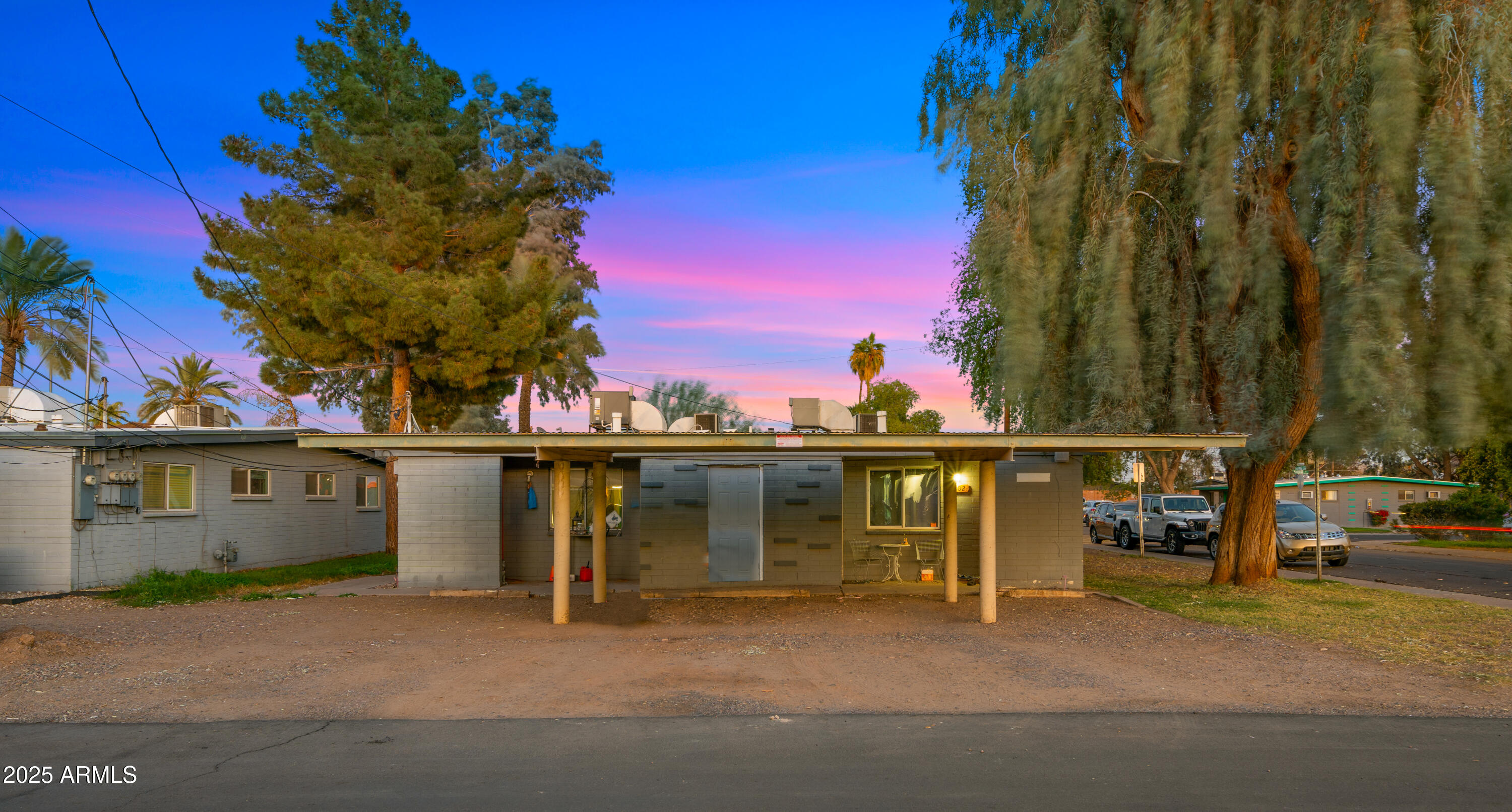 908 South Mariana Street, Unit A Tempe, AZ 85281 - Photo 3 of 10 a view of a lake with a house in the background