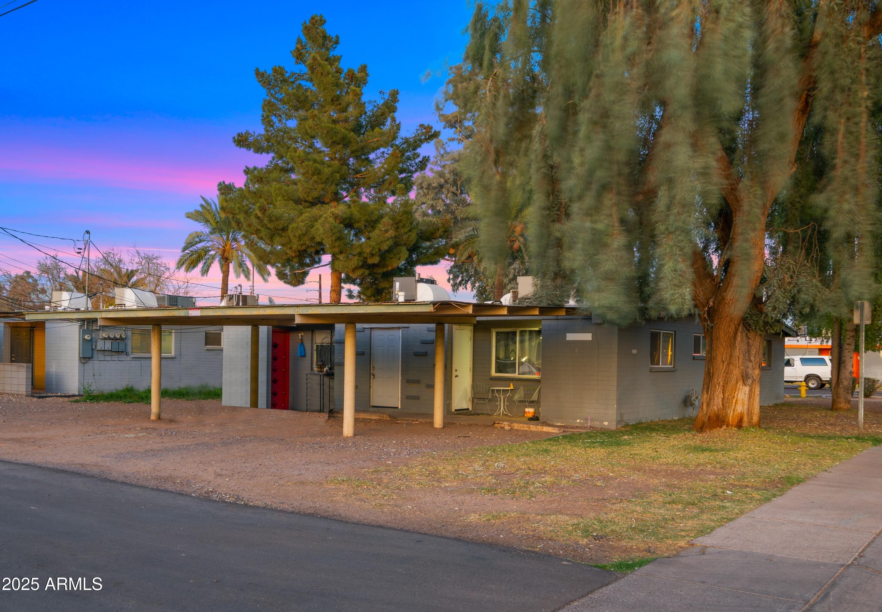 908 South Mariana Street, Unit A Tempe, AZ 85281 - Photo 10 of 10 a front view of a house with a garden
