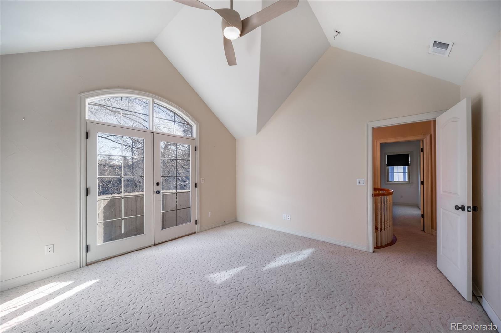 1425 South Elizabeth Street Denver, CO 80210 - Photo 22 of 50 an empty room with windows