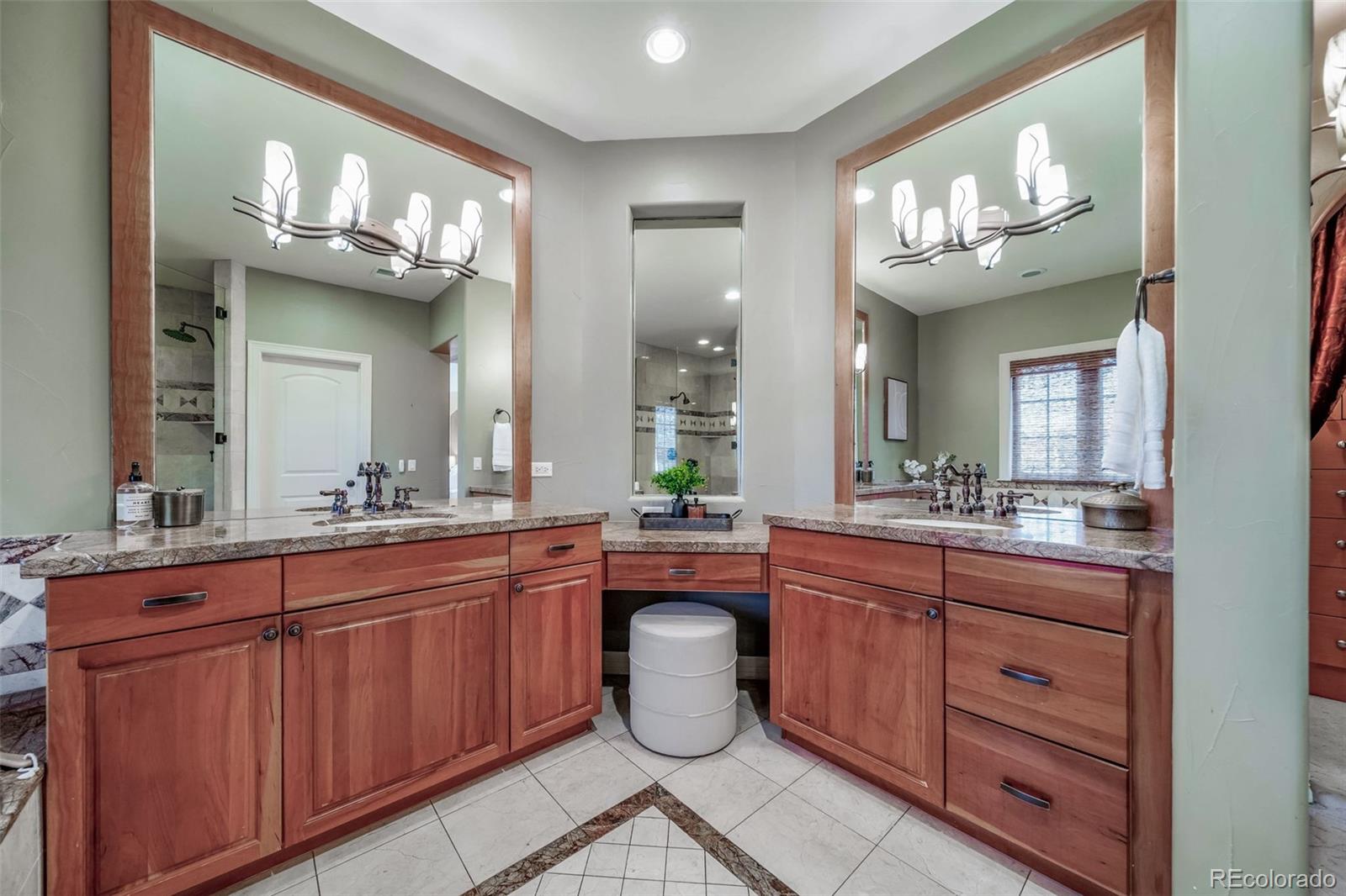 1425 South Elizabeth Street Denver, CO 80210 - Photo 30 of 50 a kitchen with cabinets and wooden floor